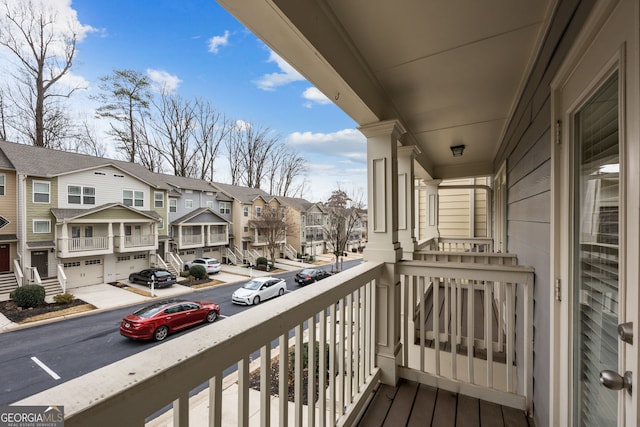 balcony featuring a residential view