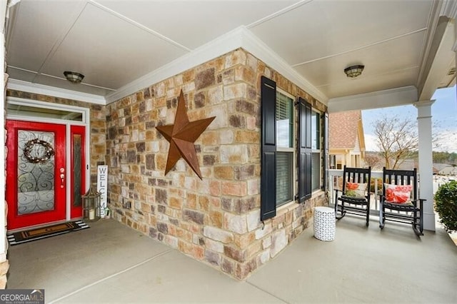 property entrance featuring covered porch