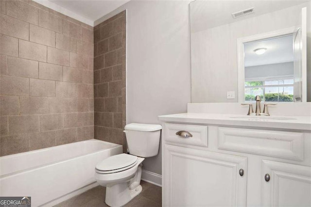 bathroom with vanity, visible vents,  shower combination, tile patterned flooring, and toilet