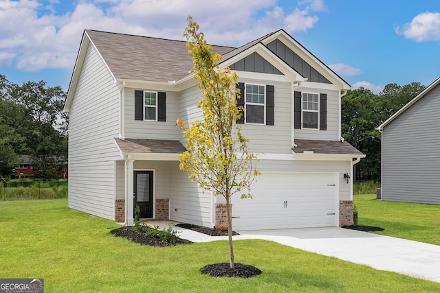 craftsman inspired home with concrete driveway, brick siding, board and batten siding, and a front yard