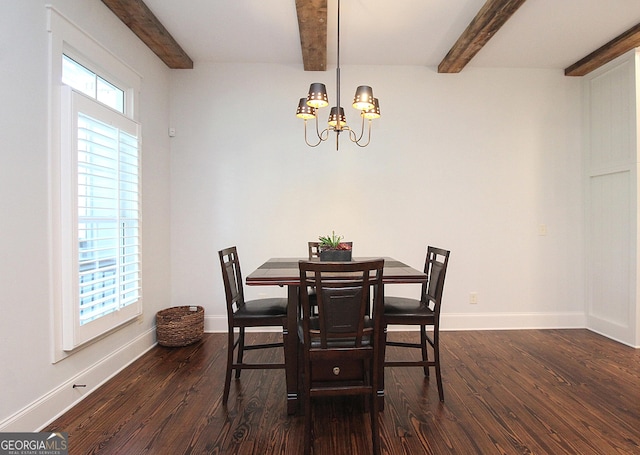 dining room featuring dark wood-style floors, beamed ceiling, baseboards, and an inviting chandelier