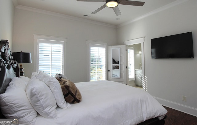 bedroom featuring visible vents, ornamental molding, a ceiling fan, wood finished floors, and baseboards