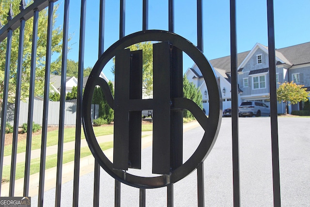 view of gate featuring a residential view