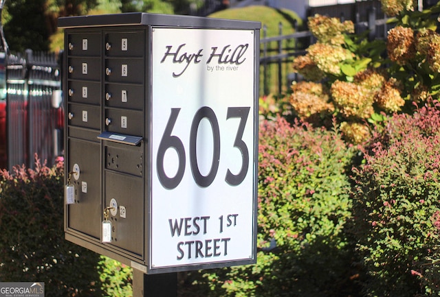 exterior details with fence and mail area