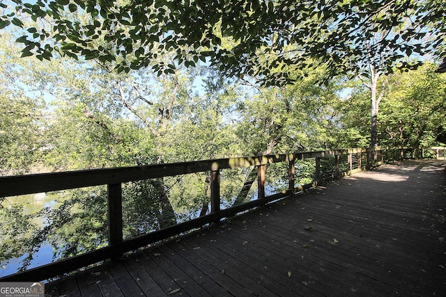 deck featuring a water view