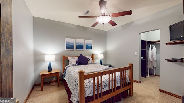 1650 Loving Rd, Morganton, GA 30560 - bedroom with visible vents, baseboards, light colored carpet, a spacious closet, and a ceiling fan