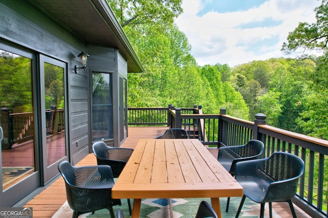 1650 Loving Rd, Morganton, GA 30560 - wooden terrace featuring a forest view and outdoor dining space
