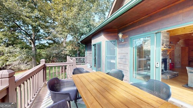 deck featuring outdoor dining space