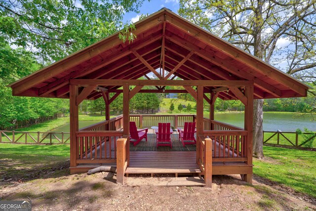 1650 Loving Rd, Morganton, GA 30560 - deck featuring a water view, fence, a gazebo, and a yard