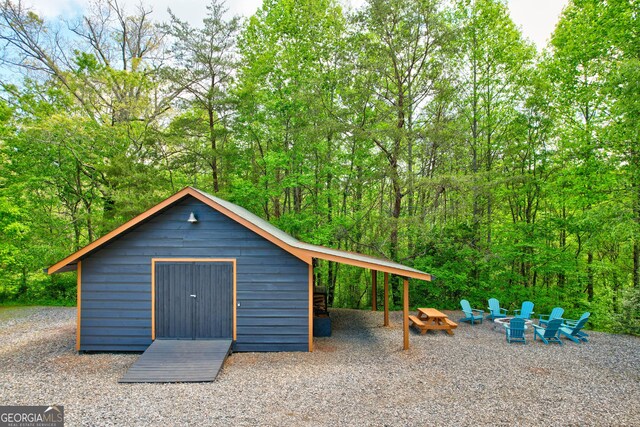 1650 Loving Rd, Morganton, GA 30560 - view of outdoor structure with an outdoor structure and a fire pit