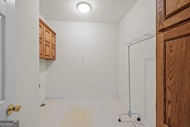 laundry room featuring laundry area and baseboards