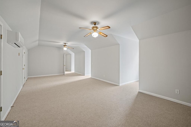 bonus room with baseboards, a ceiling fan, a wall unit AC, vaulted ceiling, and carpet flooring