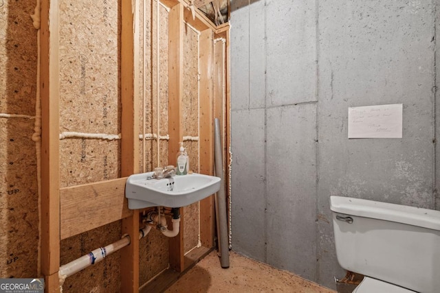 half bathroom with toilet