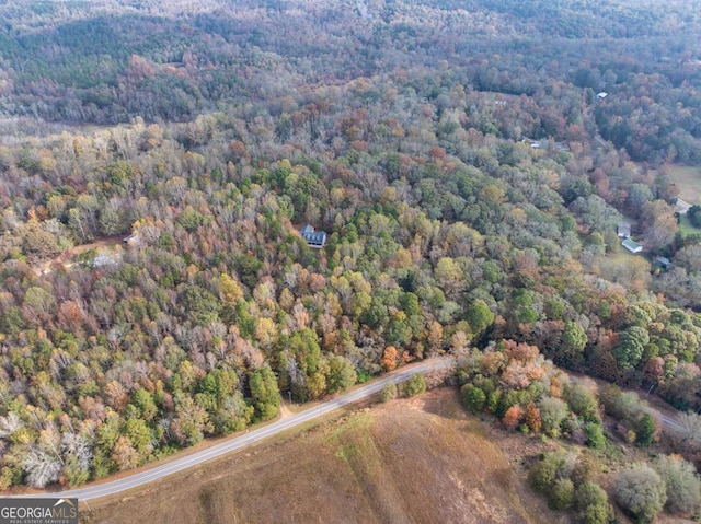 aerial view featuring a forest view