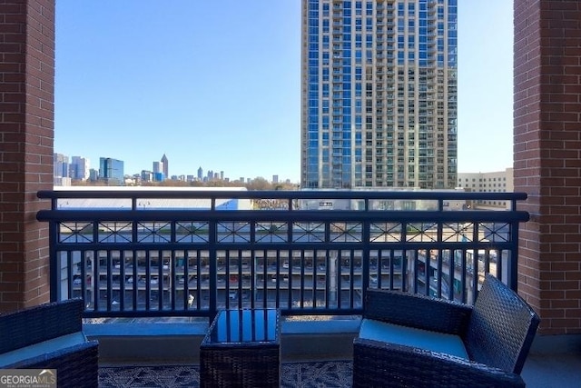 balcony featuring a city view