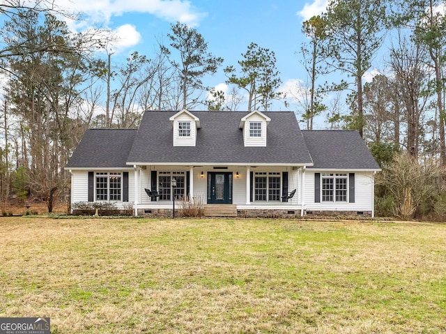 cape cod-style house with crawl space, roof with shingles, a porch, and a front yard