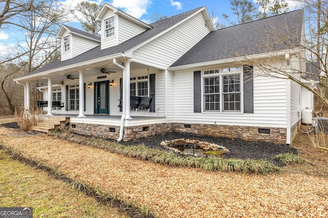 view of front of house with ceiling fan, a porch, crawl space, and a shingled roof