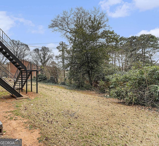 view of yard with stairway