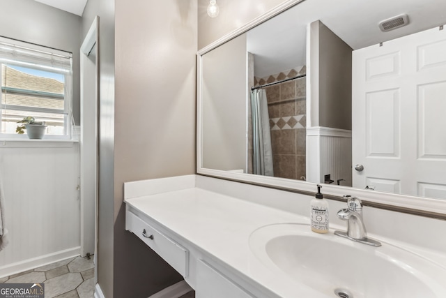 bathroom with tile patterned flooring, visible vents, vanity, and a shower with curtain