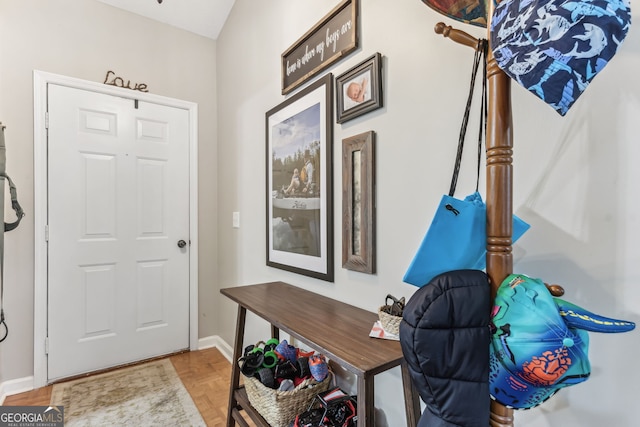 interior space featuring baseboards