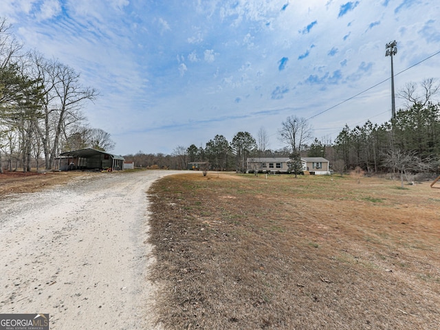 view of road featuring driveway