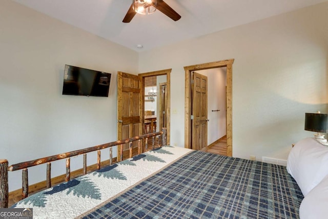 bedroom featuring baseboards, visible vents, and ceiling fan