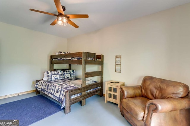 bedroom with baseboards and carpet floors