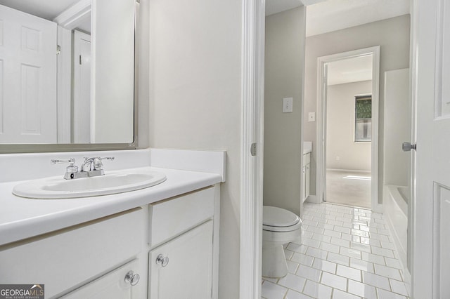 6437 Stone Way, Morrow, GA 30260 - full bath with vanity, a bath, tile patterned floors, and toilet