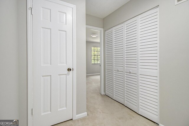 6437 Stone Way, Morrow, GA 30260 - hallway featuring baseboards, carpet, and visible vents