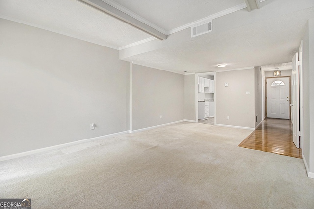 6437 Stone Way, Morrow, GA 30260 - unfurnished living room with crown molding, light colored carpet, baseboards, and visible vents