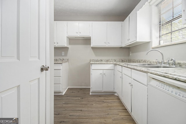 6437 Stone Way, Morrow, GA 30260 - kitchen with wood finished floors, white dishwasher, light countertops, white cabinets, and a sink