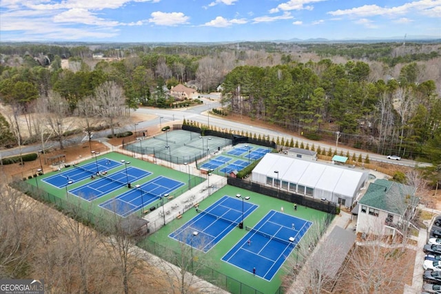 bird's eye view with a view of trees