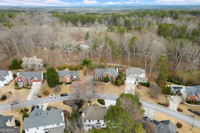 bird's eye view with a residential view and a forest view