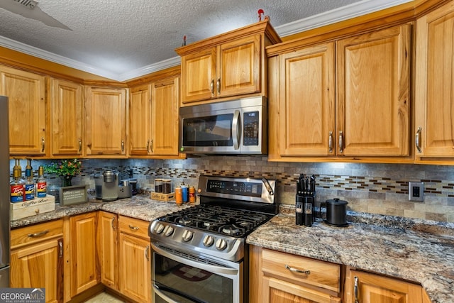 kitchen with light stone countertops, tasteful backsplash, ornamental molding, and stainless steel appliances