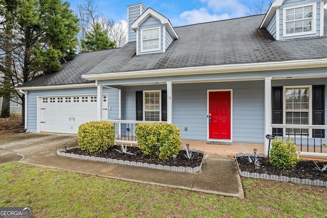 view of front facade featuring covered porch, driveway, a shingled roof, and an attached garage