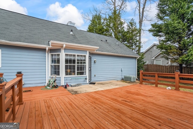 deck featuring fence and central AC unit