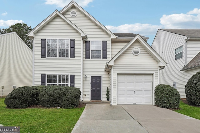 traditional-style home featuring a front yard, concrete driveway, and an attached garage