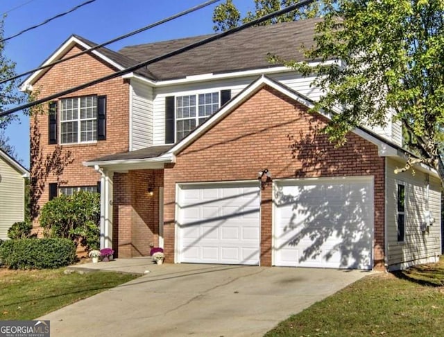 traditional-style home featuring brick siding, concrete driveway, and a garage