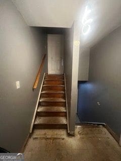 405 Fairburn Rd SW Unit 107, Atlanta, GA 30331 - staircase with baseboards