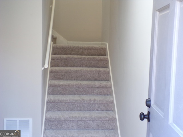 2401 Northlake Ct, Atlanta, GA 30345 - stairway with baseboards and visible vents