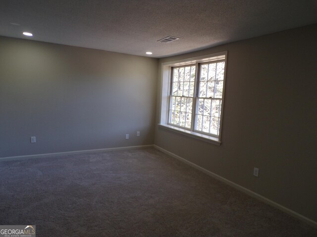 2401 Northlake Ct, Atlanta, GA 30345 - spare room with visible vents, carpet, baseboards, recessed lighting, and a textured ceiling