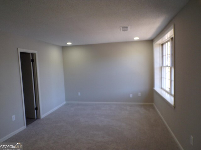 2401 Northlake Ct, Atlanta, GA 30345 - spare room featuring recessed lighting, baseboards, visible vents, and carpet floors