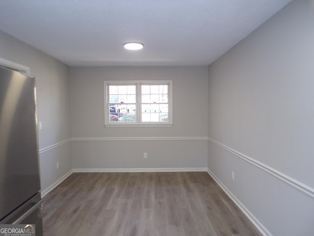 2401 Northlake Ct, Atlanta, GA 30345 - unfurnished room featuring baseboards and light wood finished floors