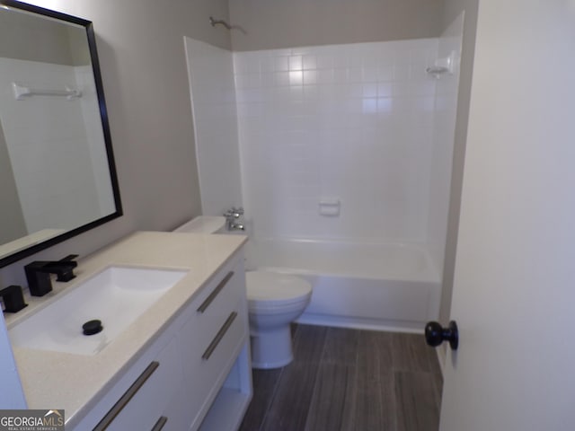 2401 Northlake Ct, Atlanta, GA 30345 - full bath featuring vanity, wood finished floors, toilet, and tub / shower combination