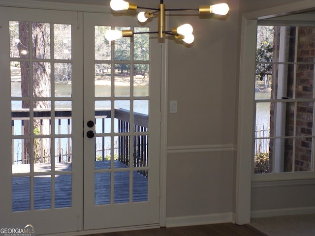 2401 Northlake Ct, Atlanta, GA 30345 - entryway featuring baseboards and a notable chandelier