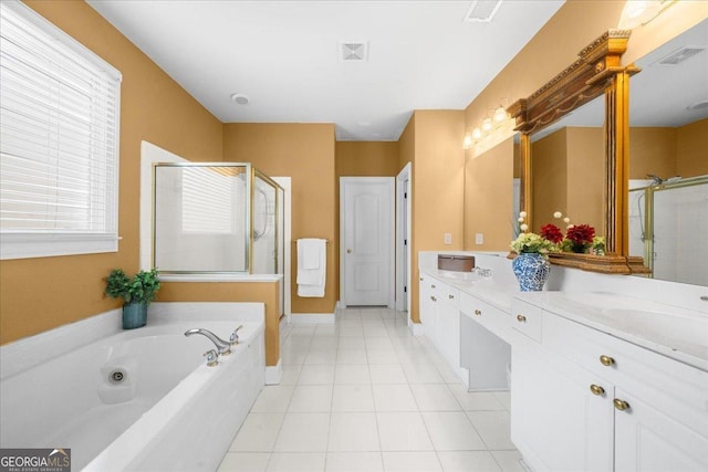 bathroom with a garden tub, visible vents, a shower stall, vanity, and tile patterned flooring