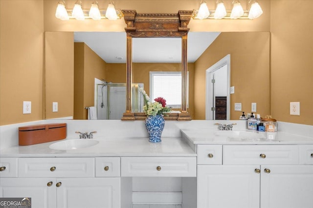 bathroom with a stall shower and vanity