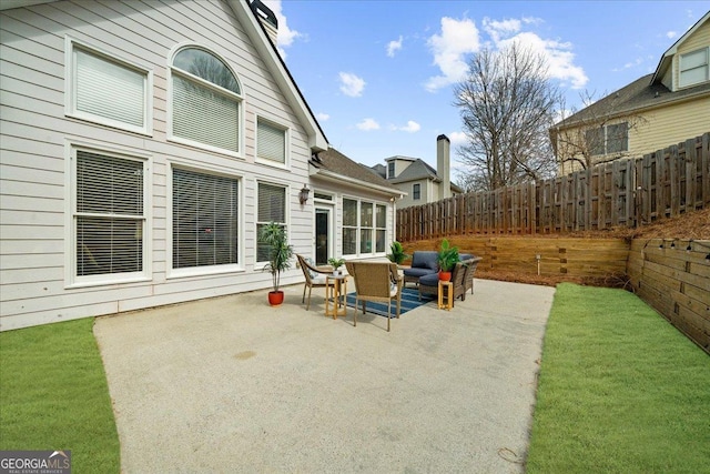 view of patio / terrace with fence