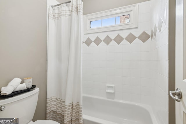 full bath with toilet and shower / tub combo with curtain