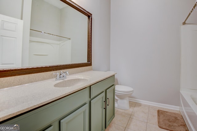 full bathroom featuring vanity, toilet, baseboards, and tile patterned flooring